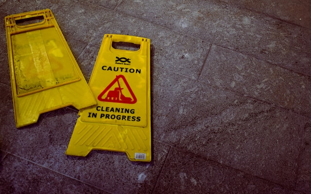 broken wet floor signs