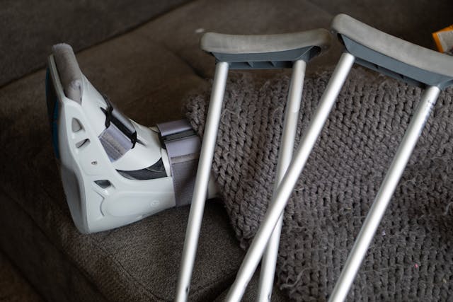 person with cast and crutches