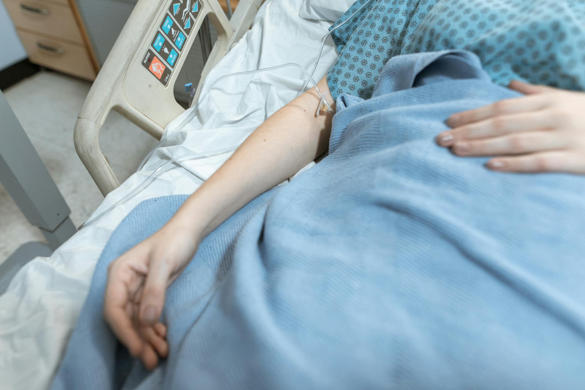 person in hospital bed