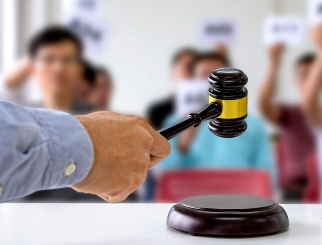 person holding auction